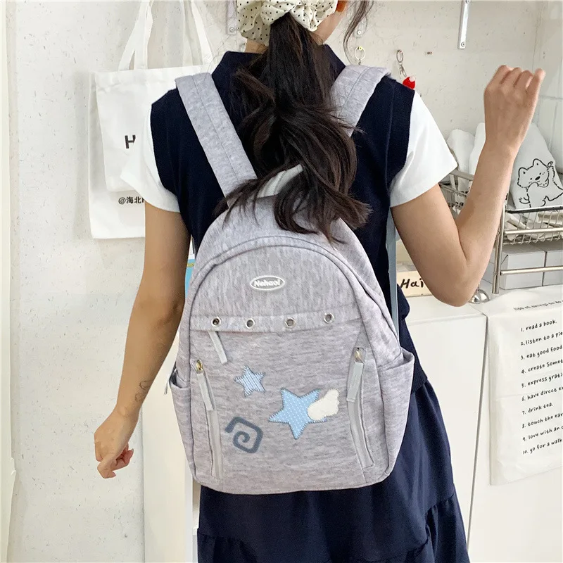 New star and cloud niche design backpack for middle and high school students, large-capacity star school bag, travel backpack fo