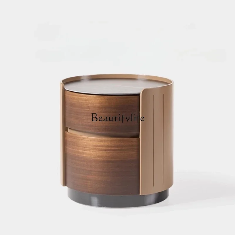 

06.-Italian minimalist solid wood bedside table simple modern bedroom light luxury designer round high-end locker