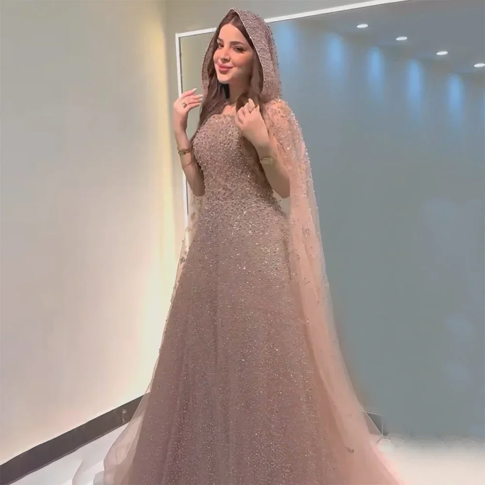 Robe de soirée rose ou rose saoudite avec perles Le guide complet pour choisir la tenue parfaite pour votre événement