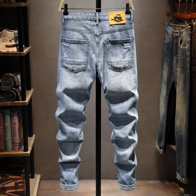 Moda Denim delik lüks giyim High-end sıkıntılı Patchwork erkek rahat ince pantolon ilkbahar sonbahar tasarımcı erkek kot