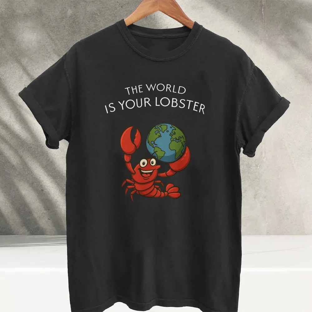 The World Is Your Lobster Funny Cartoon Lobster Holding Earth Graphic T‑Shirt Humor Sea Creature Slogan Print Cotton Casual Tops