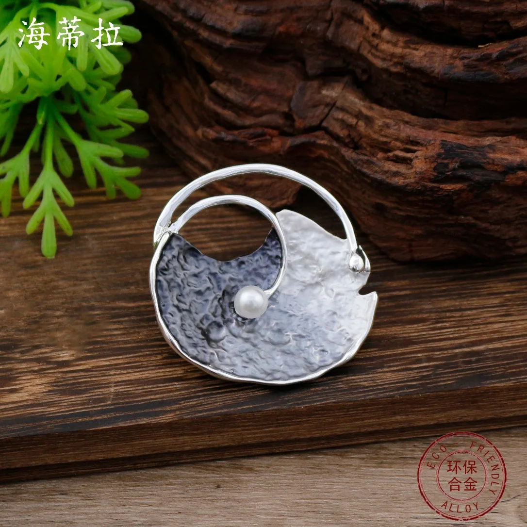 Jewelry DIY accessories new gradual change enamel color hollow geometric shell magnetic brooch women's creative advanced sense g