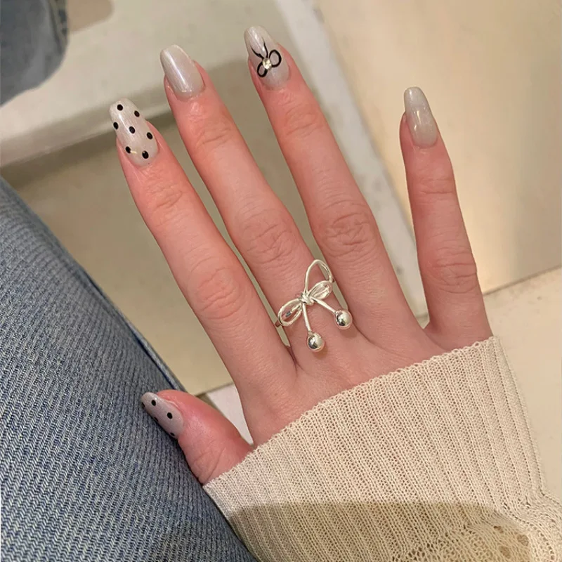 PANJBJ 925 Sterling Silver Bow Knot Ring Hollowing Out Korean Minimalism Tassels Fashion Jewelry Gift Dropshipping