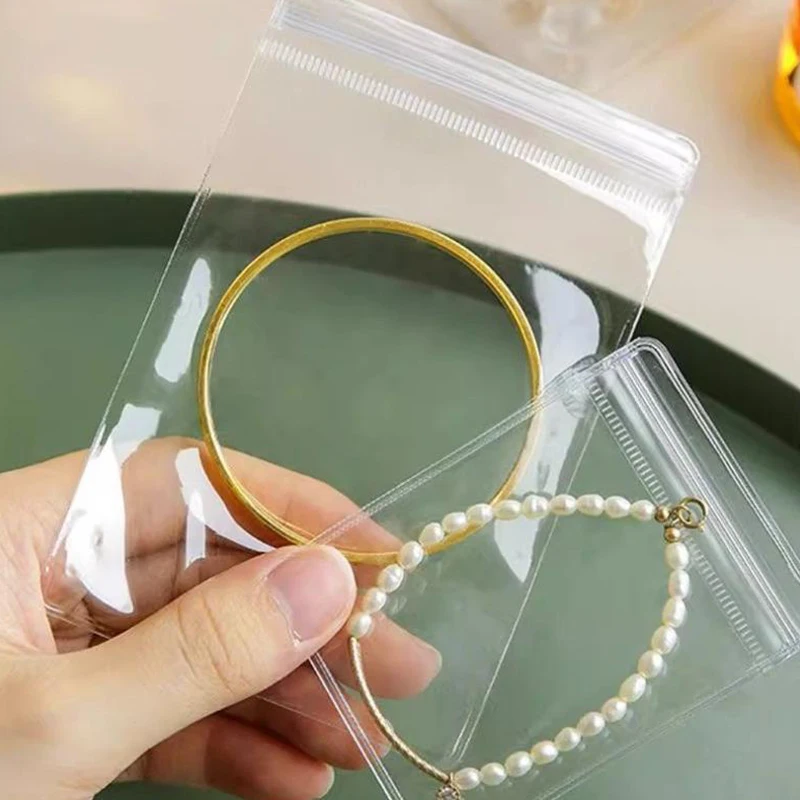 

10 шт., прозрачные мешочки для ювелирных изделий из ПВХ, сумка для хранения на молнии для серег, ожерелья, ювелирных изделий, антиокислительные упаковочные пакеты