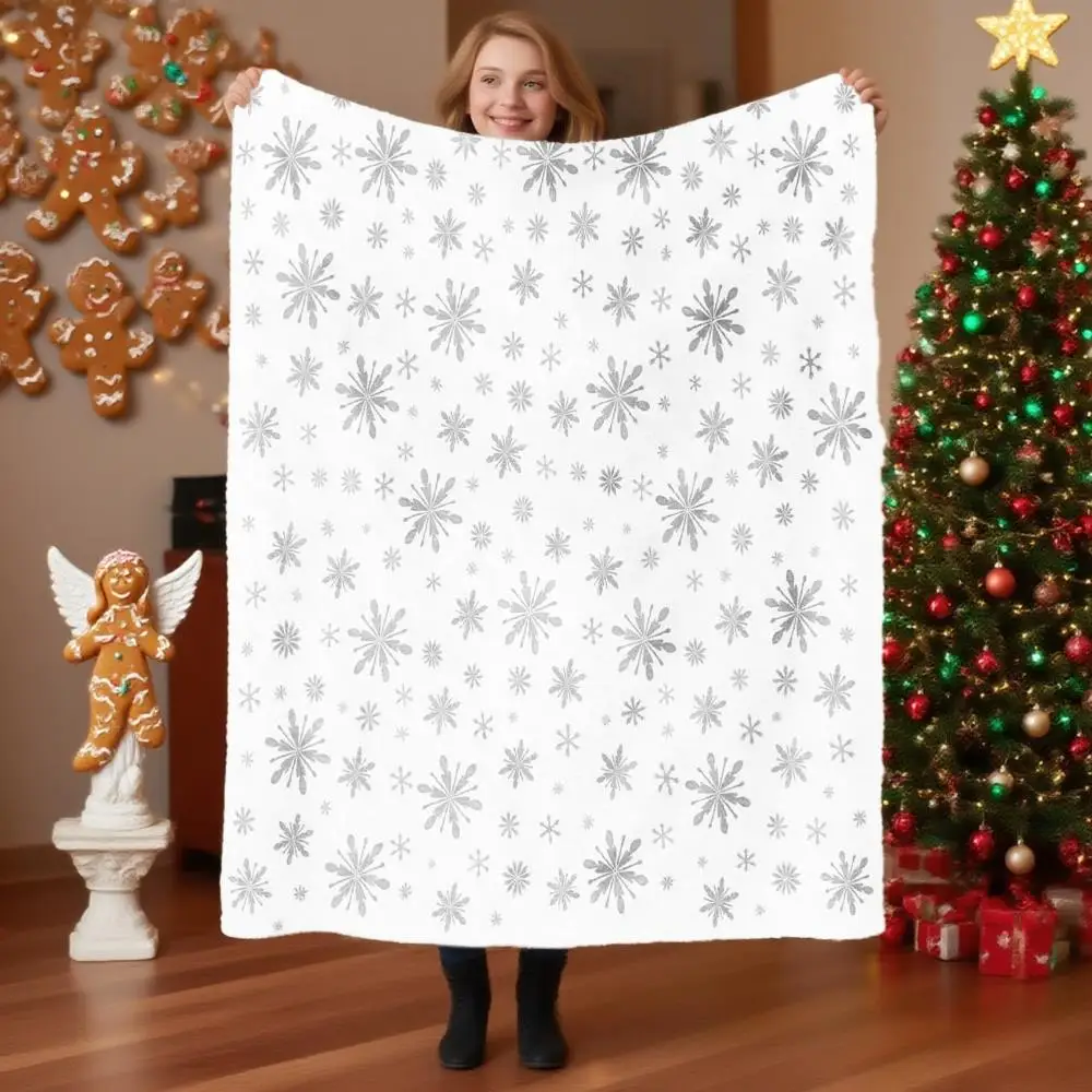 White and gray snowflake pattern blanket, polyester fabric, machine washable, suitable for home, office, and dormitory.