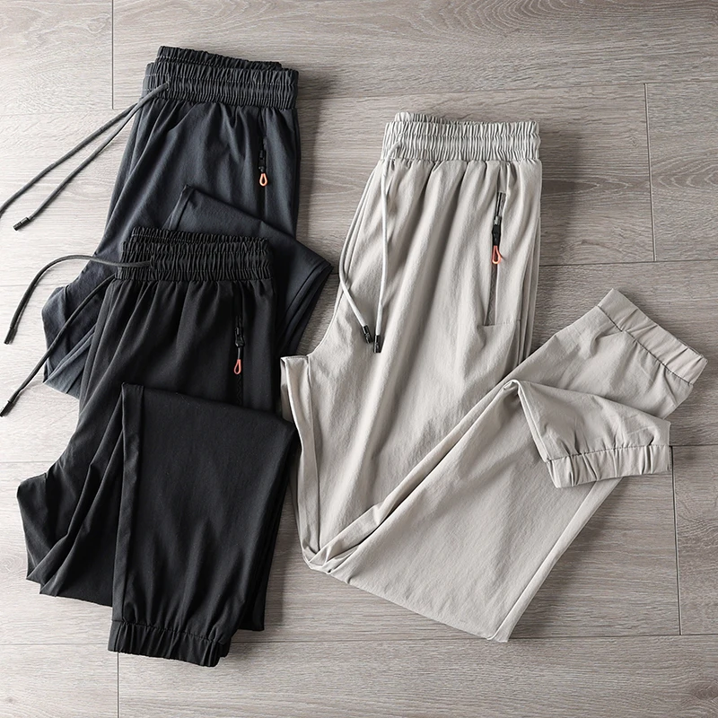 

Outdoor Profional Lightweight Breathable Elastic Slim Fit Sports Casual Pants Men's Spring Summer Long Trousers