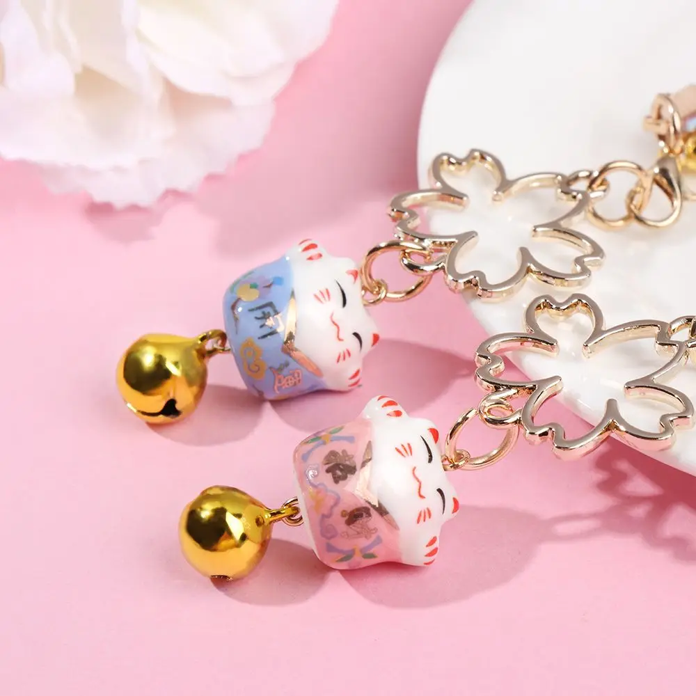 حبل قلادة شريط لتعليق الهاتف المحمول الحبل محظوظ القط جرس ساكورا الهاتف الحبل مكافحة خسر سلسلة مفاتيح قصيرة المعصم حبل شريط لتعليق الهاتف المحمول الحبل