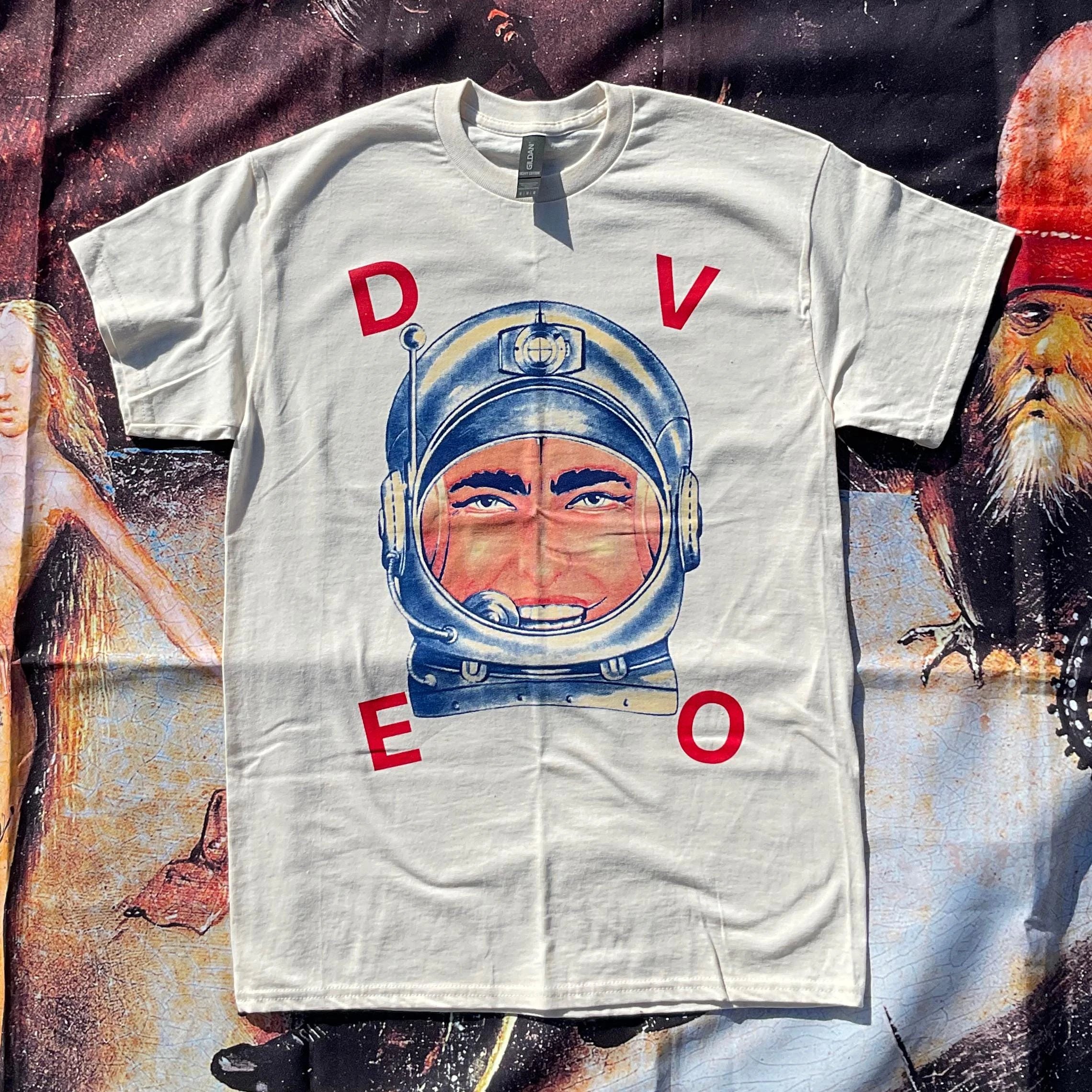 The Beige T-shirt Features The Classic 