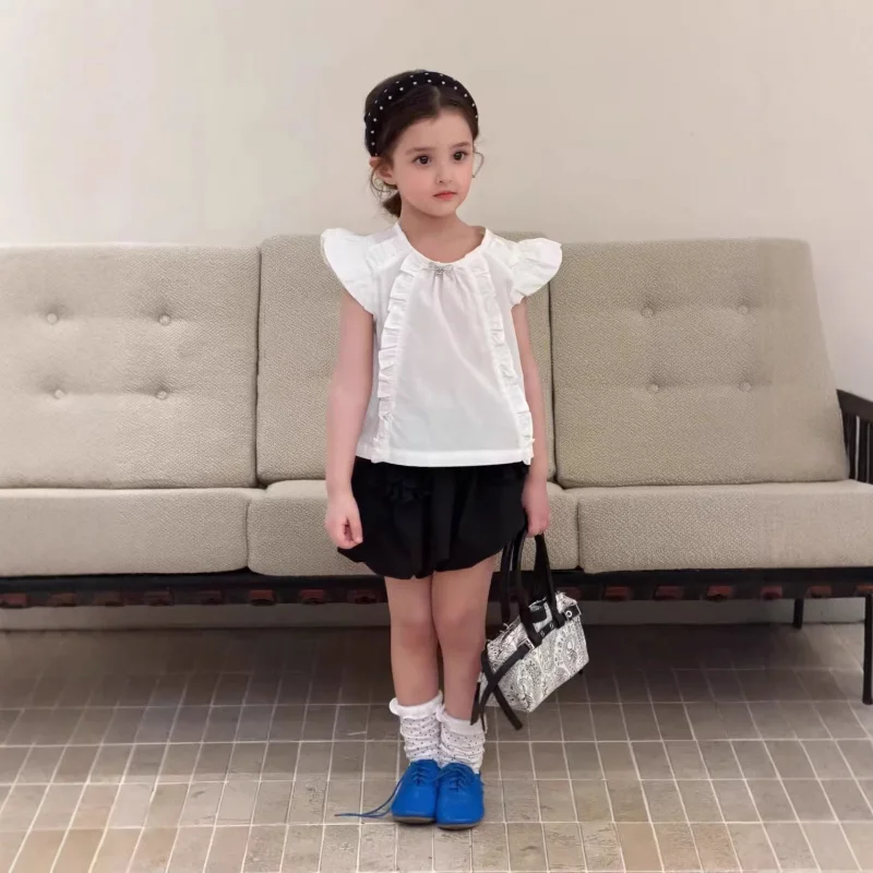 

Children's clothing for girls: sweet top with flutter sleeves and shorts2026New summer children's clothing supply