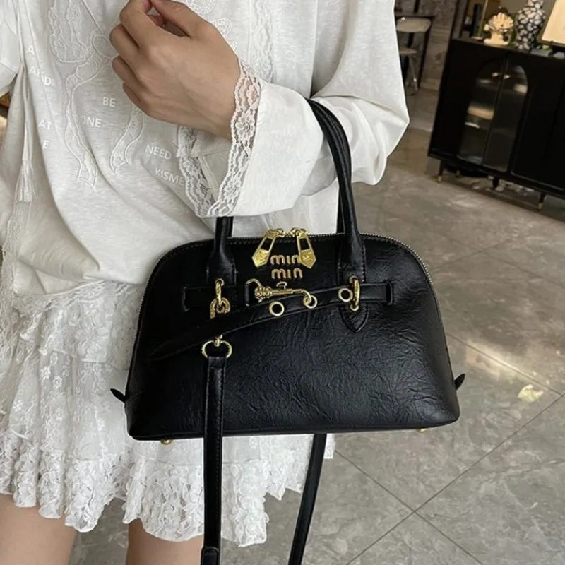 

Дизайнерские элегантные сумки для подгузников для женщин, простые винтажные кожаные сумки, минималистичные, модные, стильные, большие сумки-тоут.