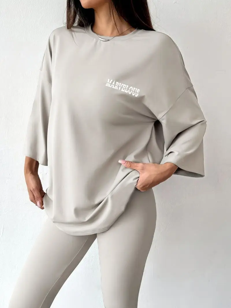 Round neck loose mid sleeve top paired with tight pants, women's casual two-piece set