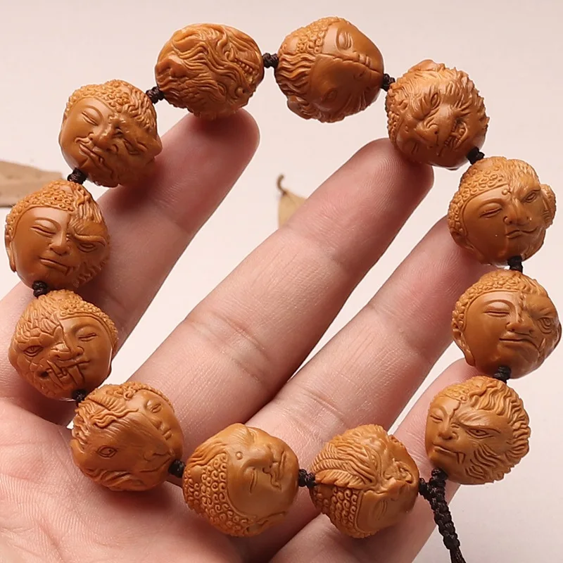 19mm carved Buddha head with the mantra 