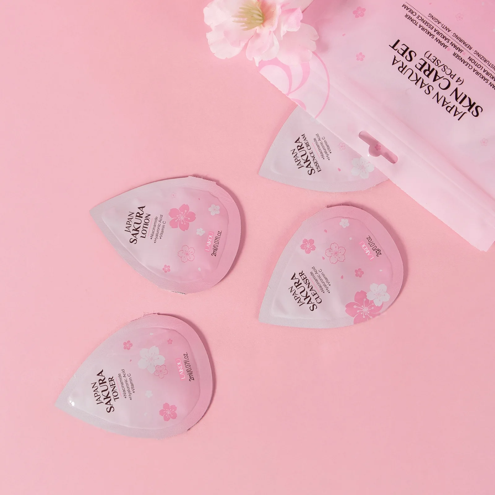 

LAIKOU Sakura 4Pcs Skin Care Set, Travel Face Care Kit Cleanser Toner Lotion Cream, Moisturizing Sample Sachet Pack 2gx4pcsx5