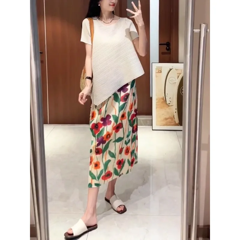 Miyake T-shirt plissé irrégulier couleur unie haut plissé haut de gamme à manches courtes 2025 été nouveau longueur ample mince T-shirt femmes