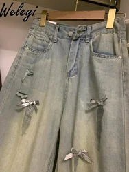 Jeans a gamba larga con fiocco strappato di grandi dimensioni donna americana 2024 estate nuovi pantaloni larghi in Denim sottile con tasca a vita alta da donna