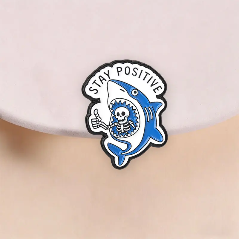 Stay Positive Enamel Pin Funny Skeleton Thumb Up in Shark Mouth Dark Humor Cartoon Marine Animal Brooch Lapel Badge Jewelry Gift