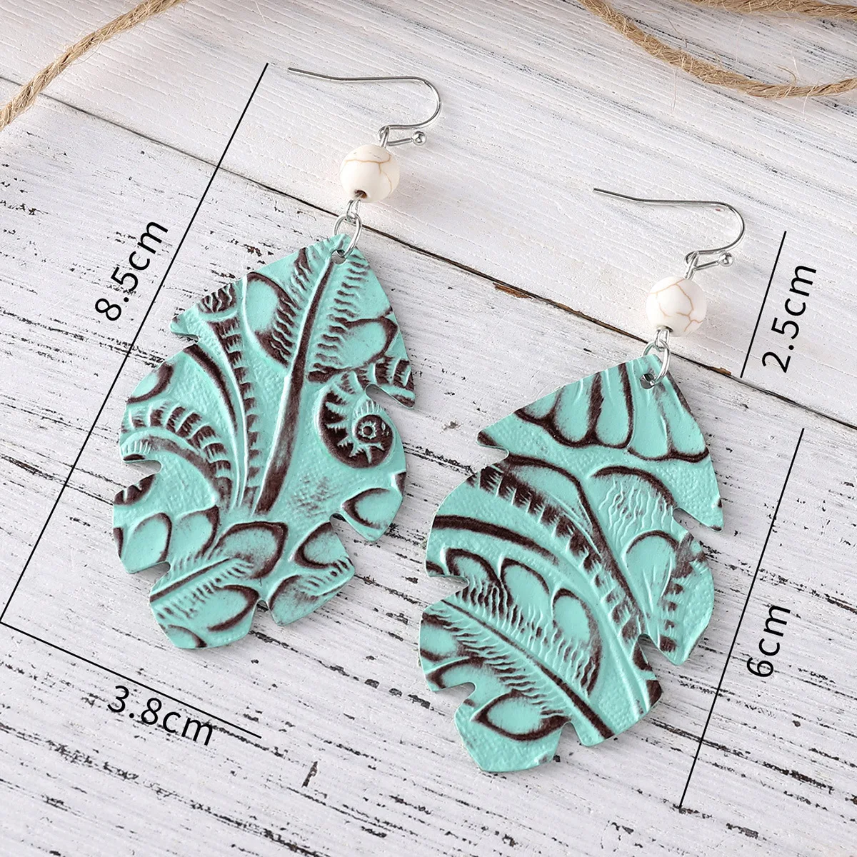 European and American cross-border western wind embossed leather earrings Bohemian leaf pattern cowhide turquoise splicing earri