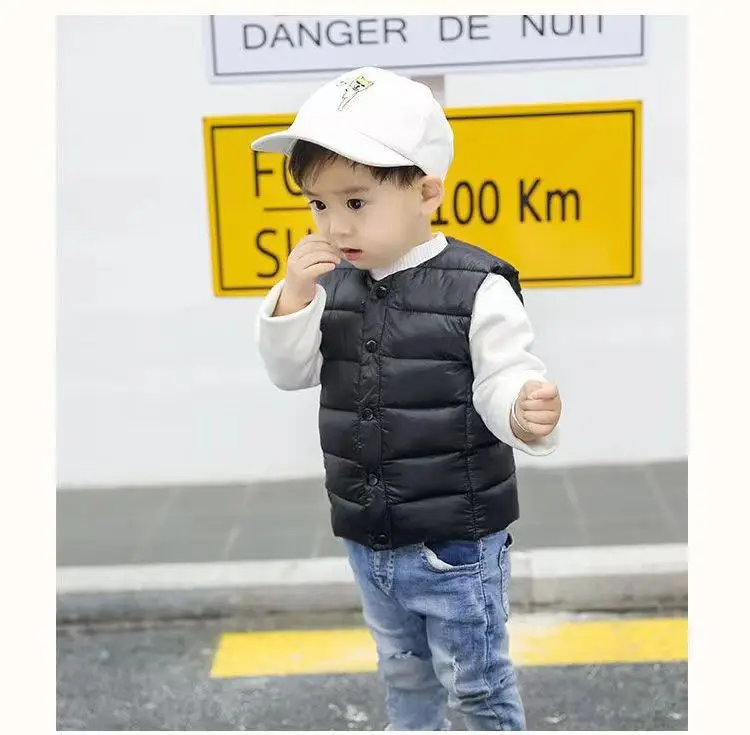 

2023 Autumn and Winter New Children's Clothing Down Cotton Vest Baby Cut Shoulder Inner Timid Small Vest Solid Color Waistcoat