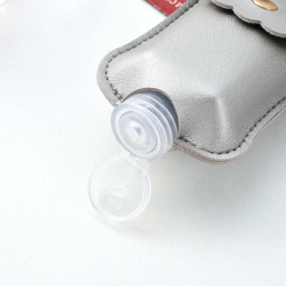 4 Stück Handflasche Mini 60 ml Flüssigkeitsbehälter Schlüsselanhänger Tragbarer Reise-Seifenspender Langlebiger Kunststoff Auslaufsicher Klar