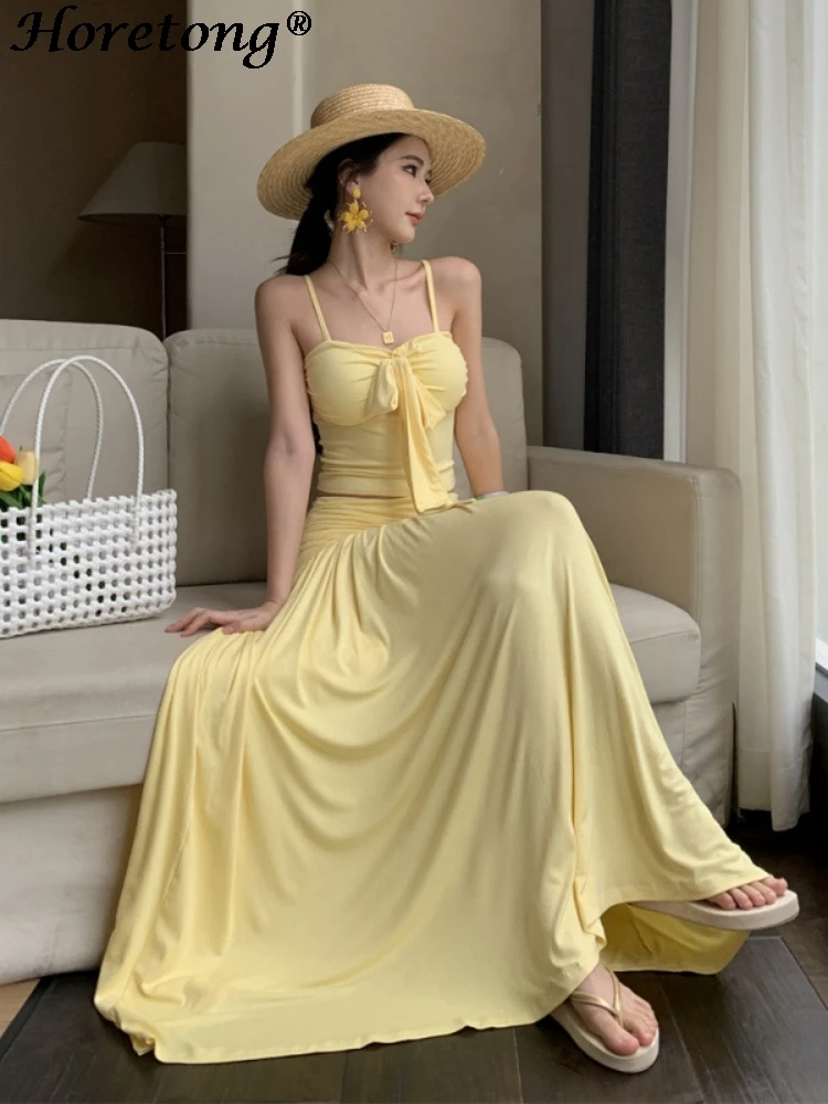

Horetong Yellow Two-piece Set Bandage Suspenders And Pleated Long A-line Skirt Suits 2025 Summer Women Sexy Elegant Soft Sets