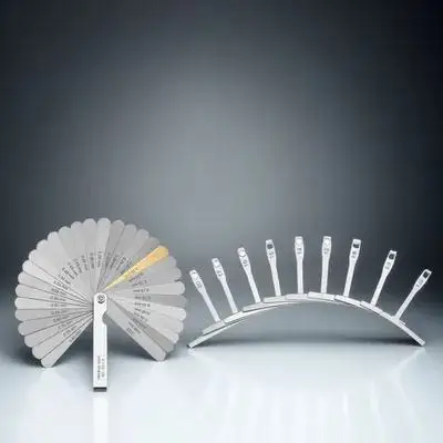 

Набор из 2-х инструментов: линейка для измерения толщины струн и измеритель радиуса струн из нержавеющей стали для гитар, для настройки грифа (для лютейеров)