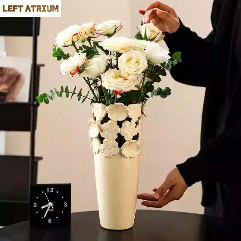 

Light luxury ceramic white cream three-dimensional relief flower vase with flower arrangement and dried flowers, living room des