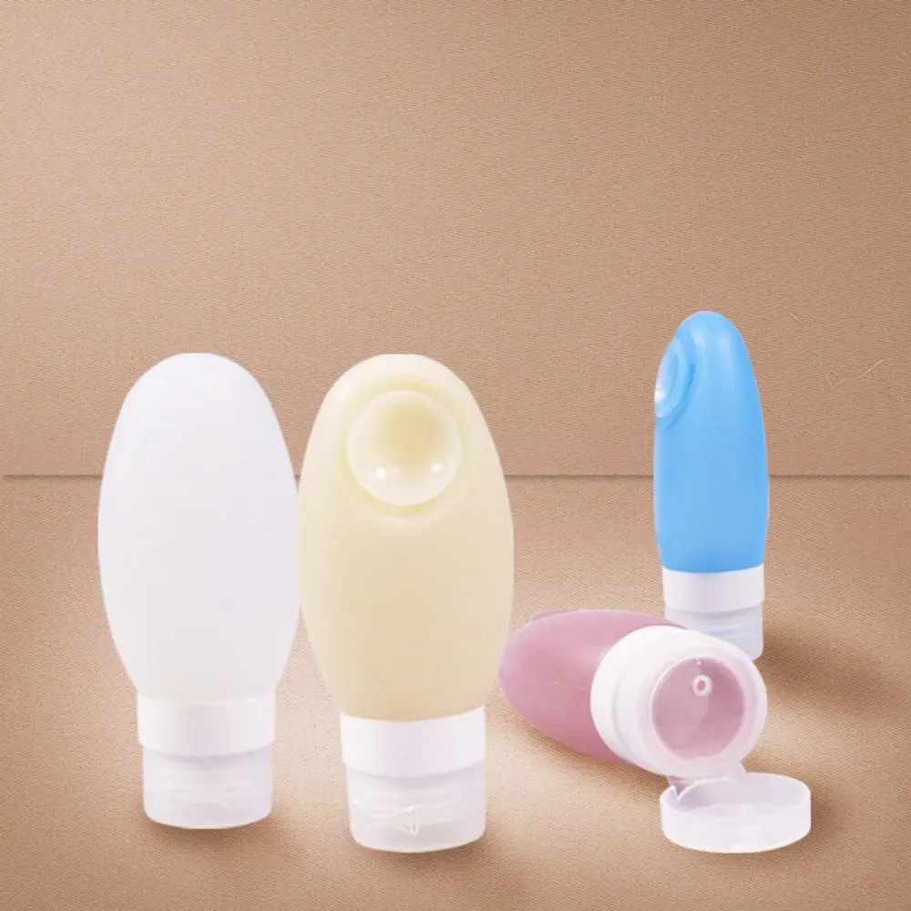 New 100ml Refillable Bottles with Suction Cups Portable Squeeze Container Silicone Split Bottle Travel Accessories