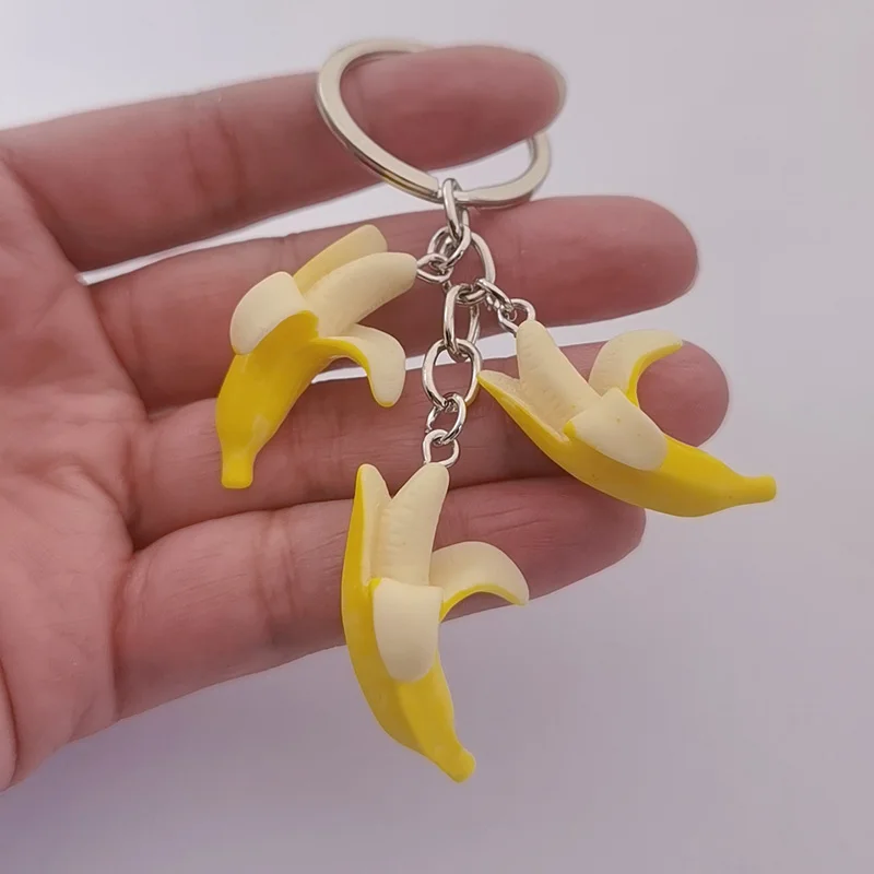 Neue Ankunft Lustige Banana Form Kreative Schöne Frucht keychain Harz banane keychain Auto Schlüssel Frauen Tasche Zubehör Schmuck Geschenke