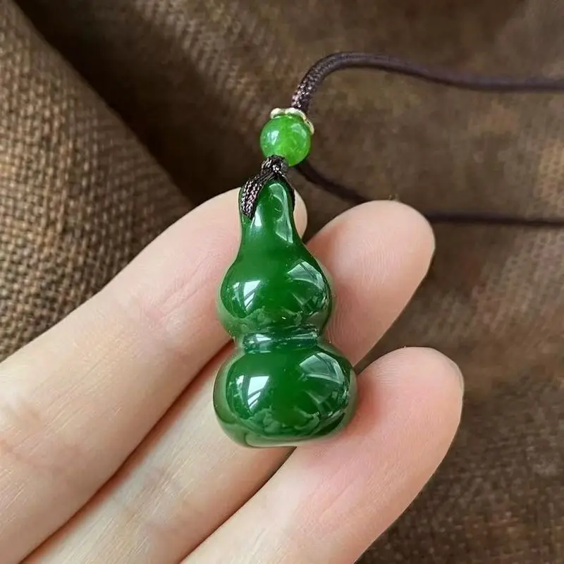 pendant made of foreign material imitating Hetian jade, in the shape of a gourd, symbolizing fortune, prosperity, and longe