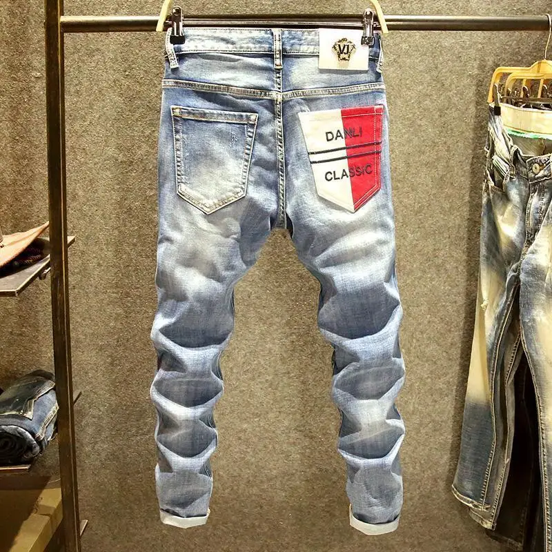 Trendy Brand White Jeans Men's Slim-fitting Elastic Pants Fashion Design Irregular Color Contrasting Back Bag Spring New Models