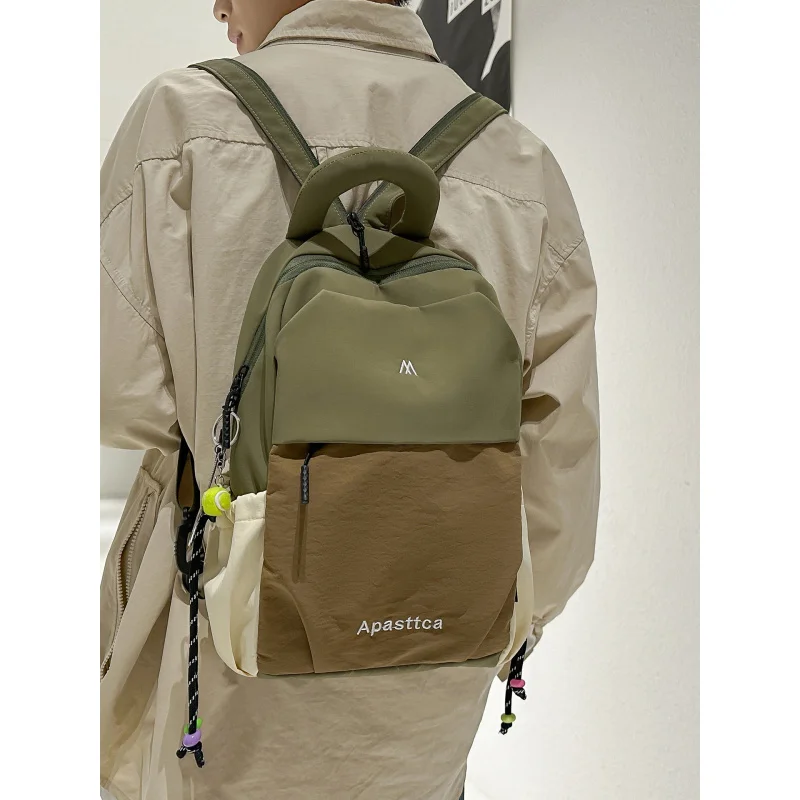 Two-tone color block backpack for women2025New model for the year, lightweight and multifunctional outdoor backpack for daily co