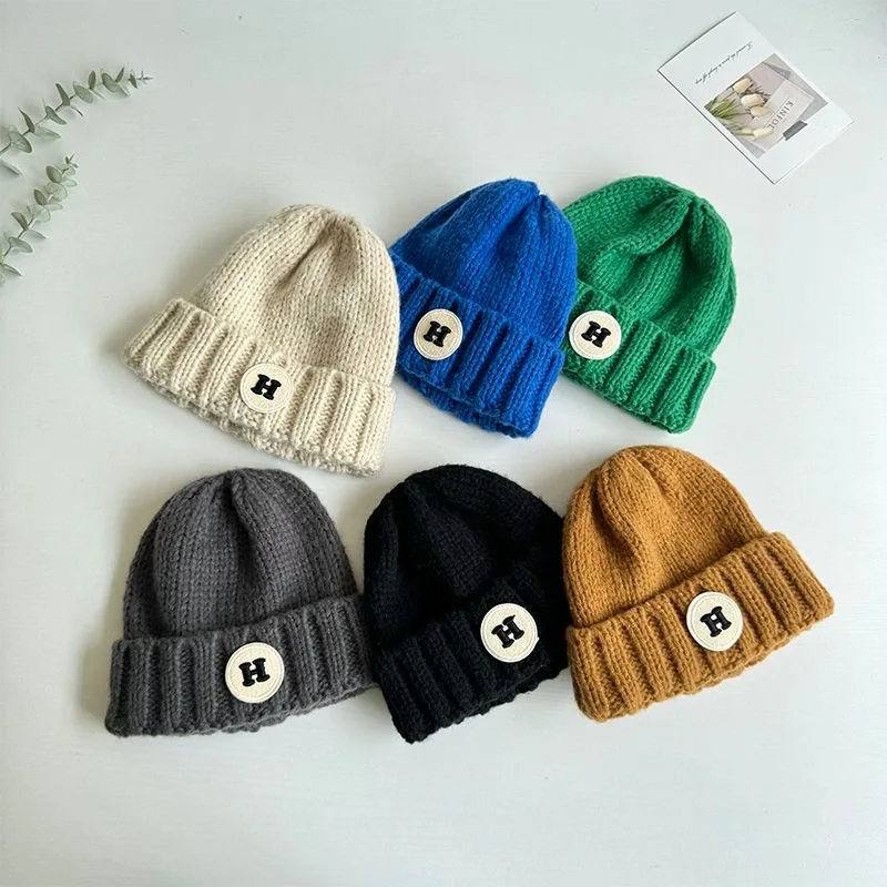 Children's hats winter boys warm single-layer wool cap baby Yangqi letters street dance knitted cap handsome tide cool