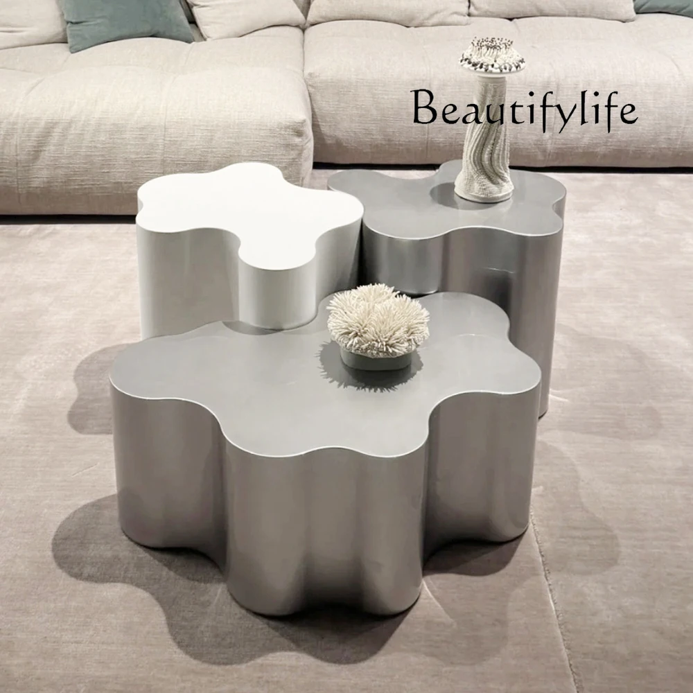 

Modern special-shaped stainless steel coffee table designer model room small apartment living room creative combination high-end