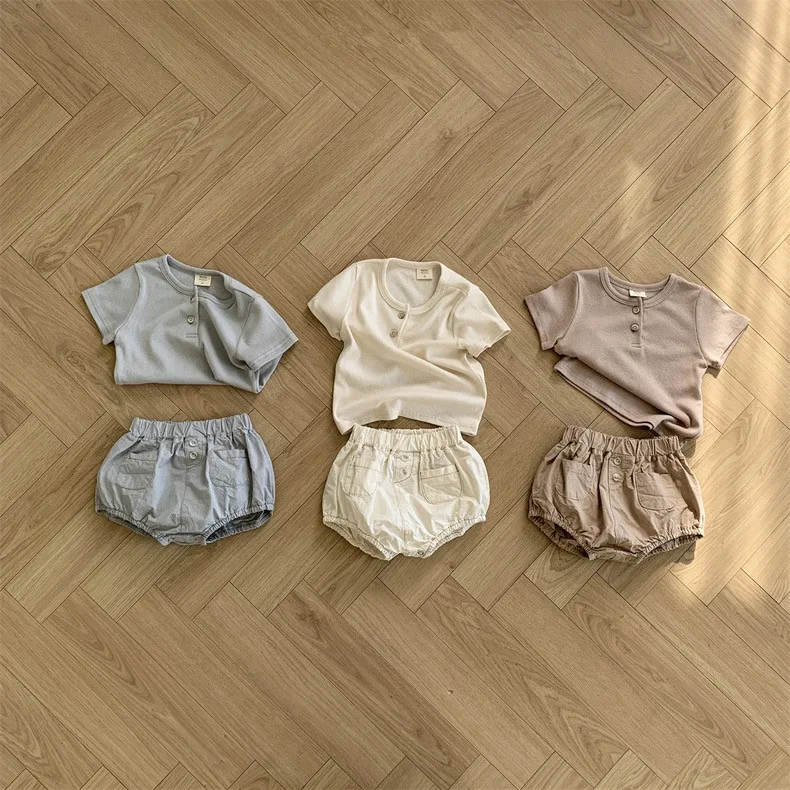 Shorts coréens pour enfants, vêtements pour enfants, mode simple, taille élastique, poche boutonnée, nouveau, été, 2024