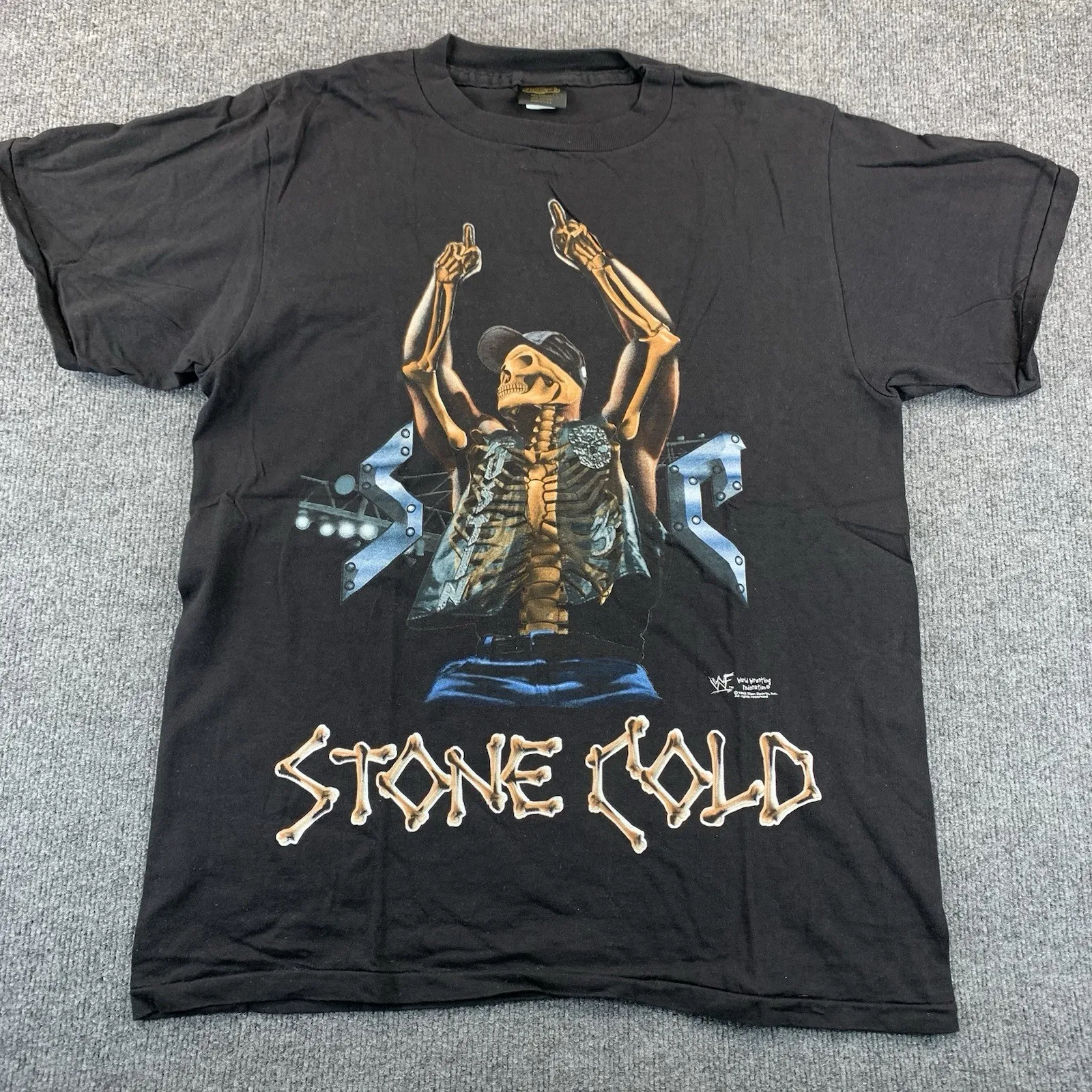 تي شيرت برسومات ستون كولد ستيف أوستن هيكل عظمي لعام 1998 باللون الأسود. علامة التغييرات كبيرة