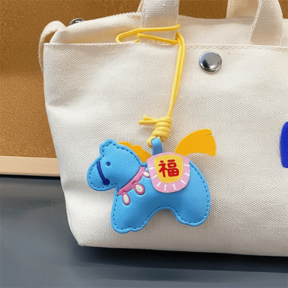 Portachiavi cavallo cartone animato in pelle zodiaco cinese zodiaco pony borsa appesa ornamento cavallo 2026 anno di cavallo ciondolo cavallo