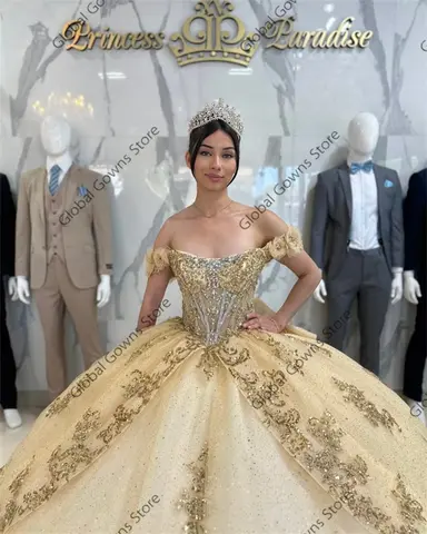 Glänsande Champagnefärgad Quinceanera-klänningar Bara Axlar Balklänning Applikation Pärlor Kristall Tyll Sweet 16 Klänning Anpassad 8 best sales champagnefärgade quinceanera-klänningar - №2