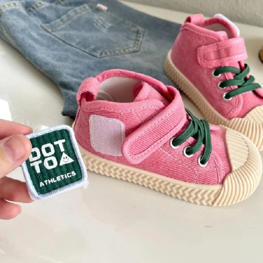 Scarpe di tela per bambini 2024 autunno New Baby Mid Top suola morbida scarpe Casual per ragazzi ragazze nero kaki pesca taglia 22-31