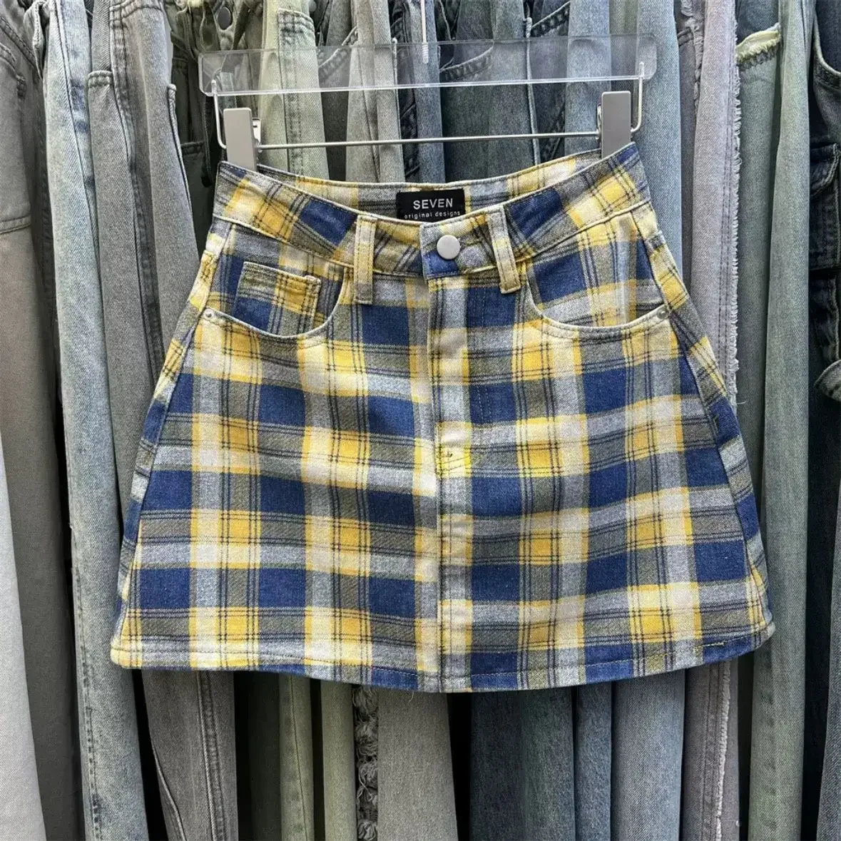 

Cowboy short skirt female 2024 summer dress new Korean version of high waist niche orange plaid slim bag hip A-word skirt.