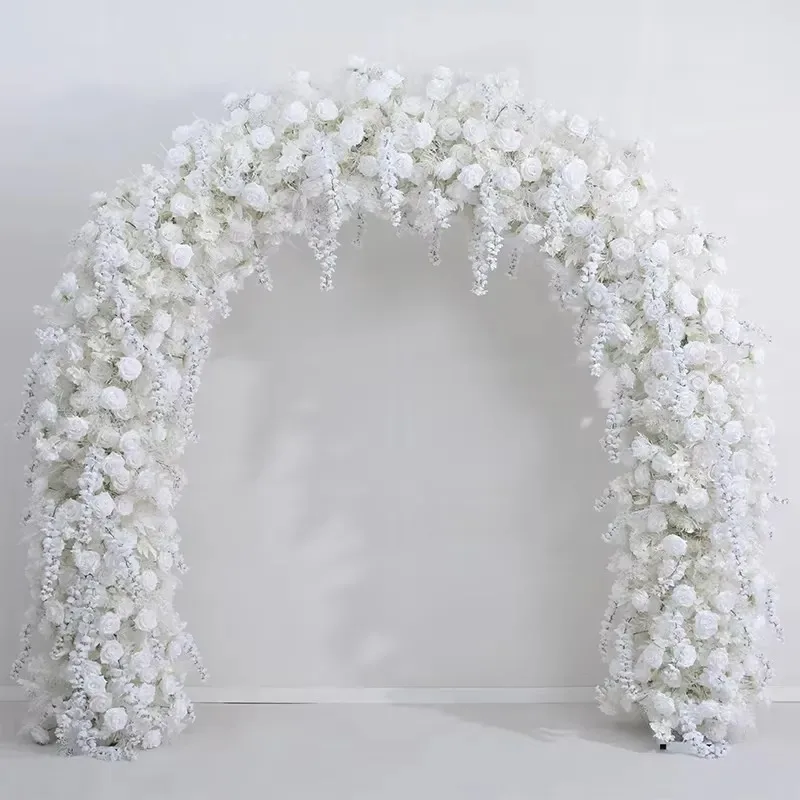 Silk-lined wedding arches adorn a long stage backdrop with cherry blossoms and hydrangea roses, suitable for ceremonial