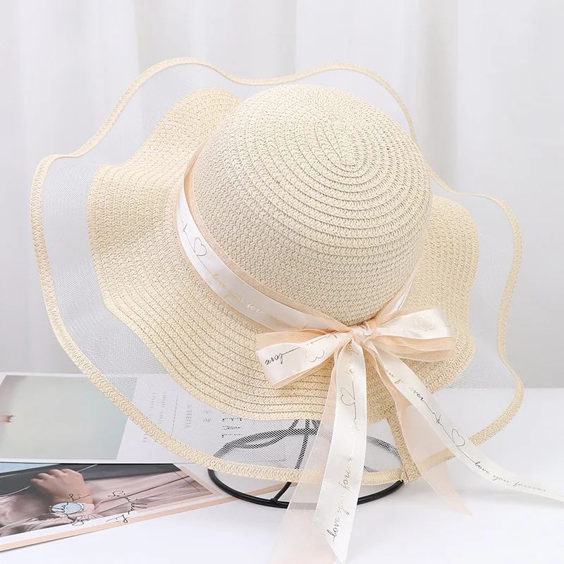 1pc Large brim bow fluttering beach hat for women, summer outdoor sunscreen fashion round top straw hat