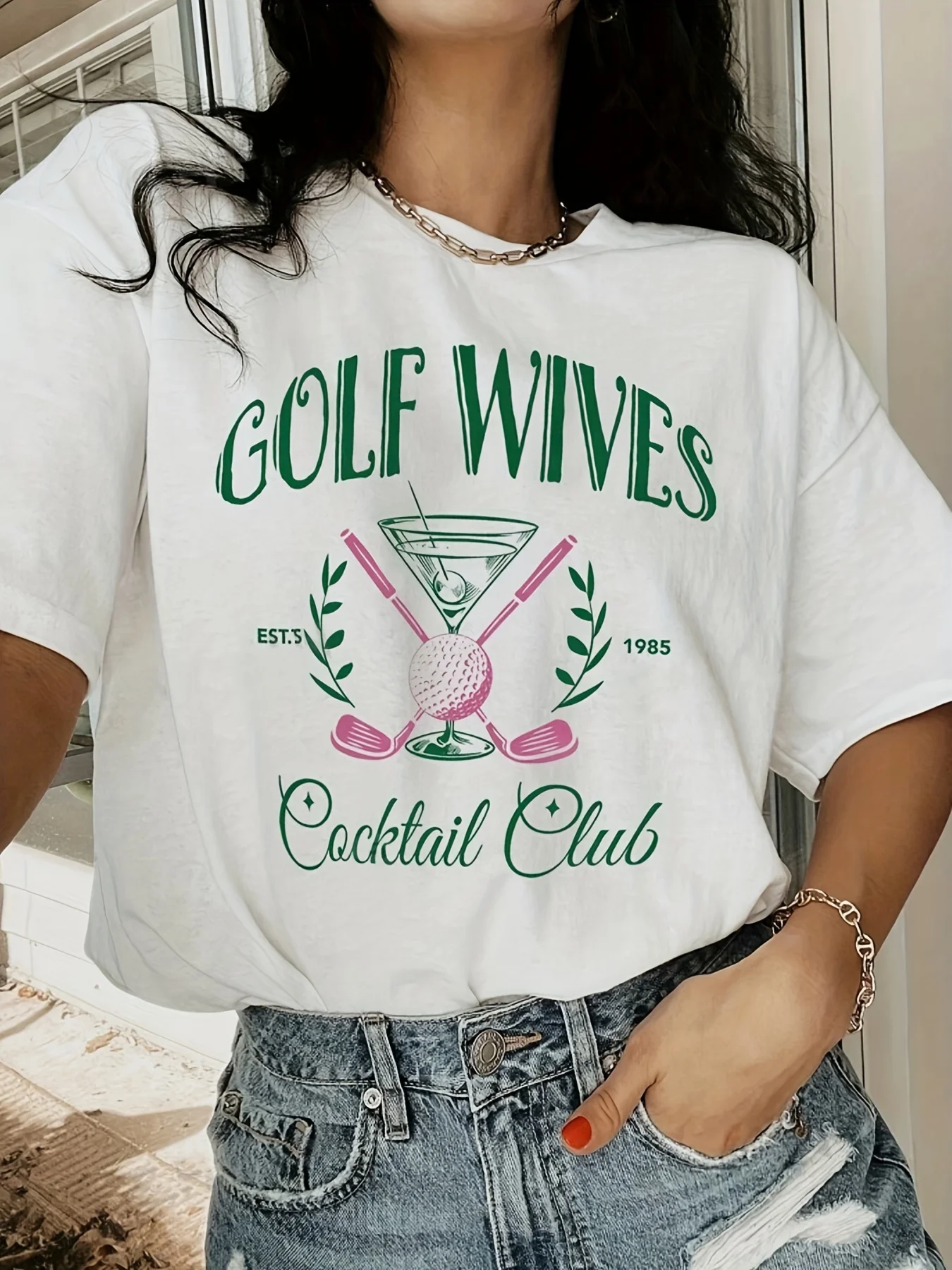 

Graphic Golf Tee Black Breathable Womens Casual Golf T-Shirt GOLF WIVES Lettering with Crossed Clubs Martini Design