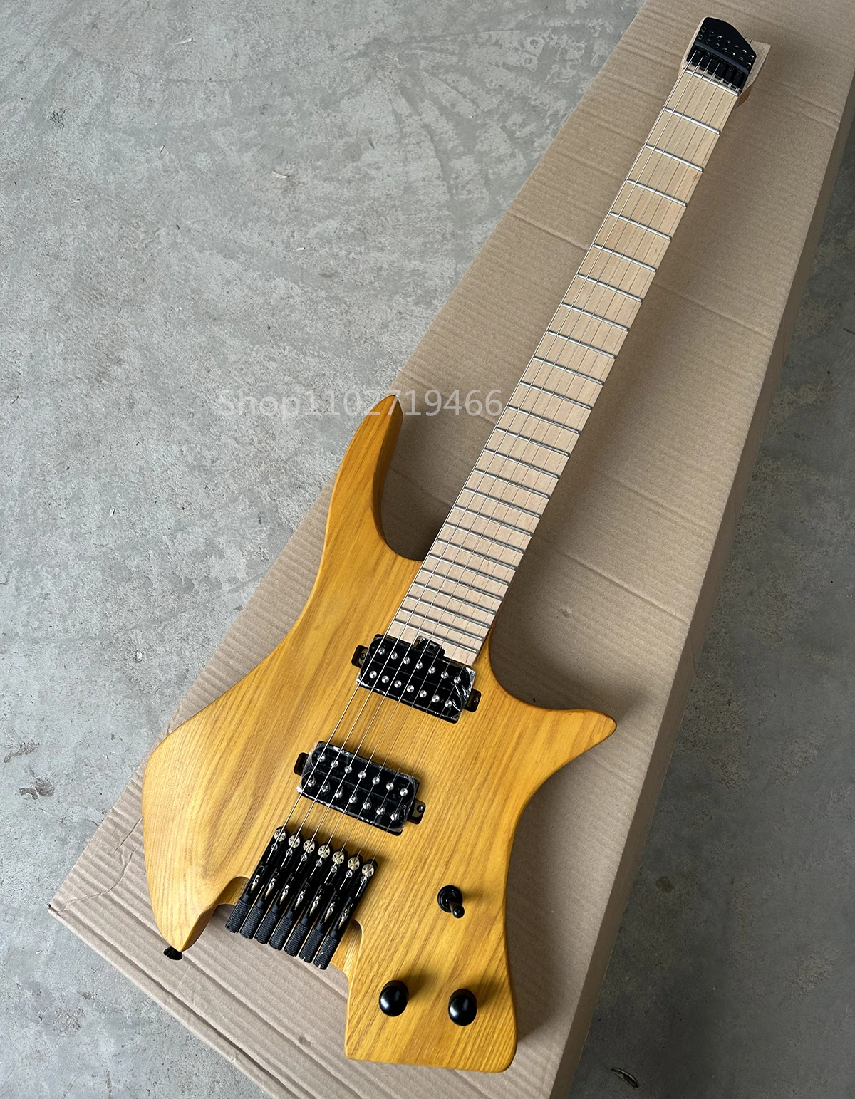 Factory Headless 7 Strings Electric Guitar Ash Body Matte Yellow Fanned Maple Fretboard Customizable