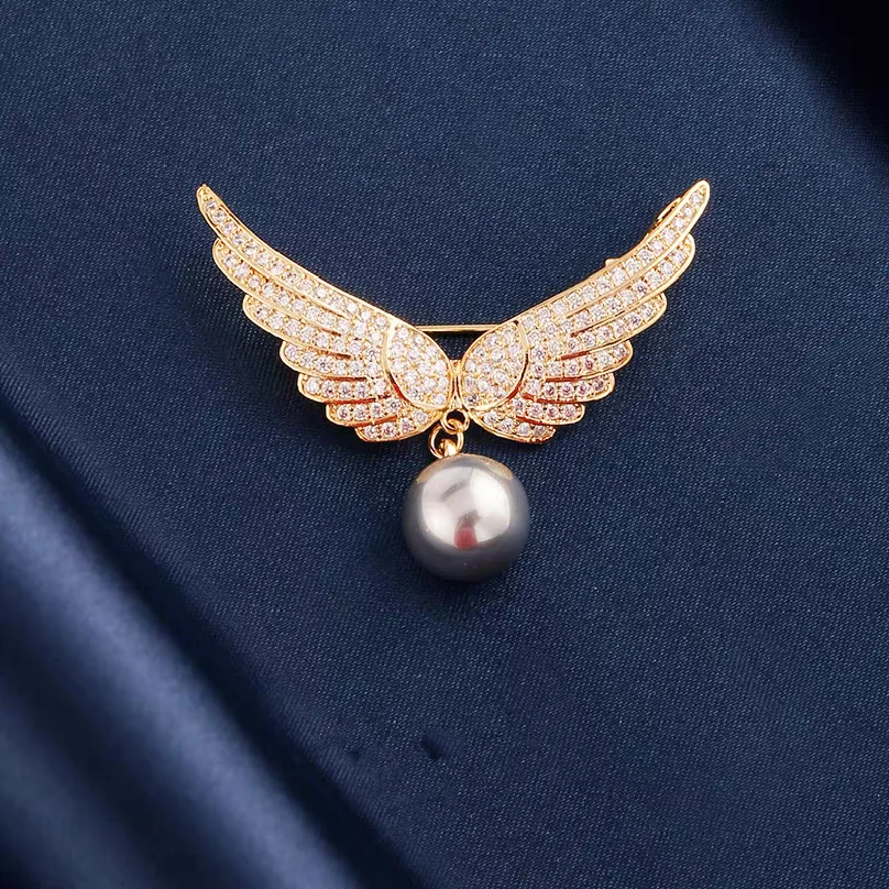 2026 new style angel wing brooch female cardigan coat pin accessory all-match anti-exposure fixed brooch wholesale