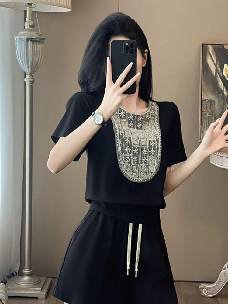 

Черные женские короткие комплекты из 2 предметов с кристаллами. Крутые эластичные новые продукты. Одинаковые стильные дешевые предложения. Женские шорты.