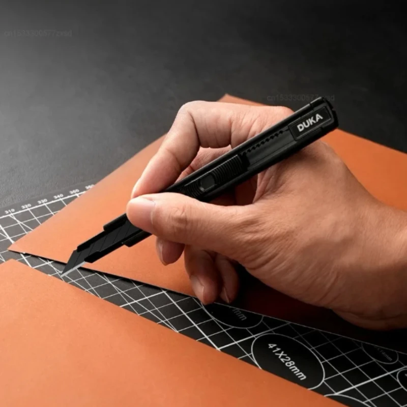 Xiaomi DUKA سكّين متعدّد الاستخدامات صندوق القاطع قابل للسحب شفرات الكربون الصلب سكين جيب تصميم القفل الذاتي أدوات القطع القرطاسية