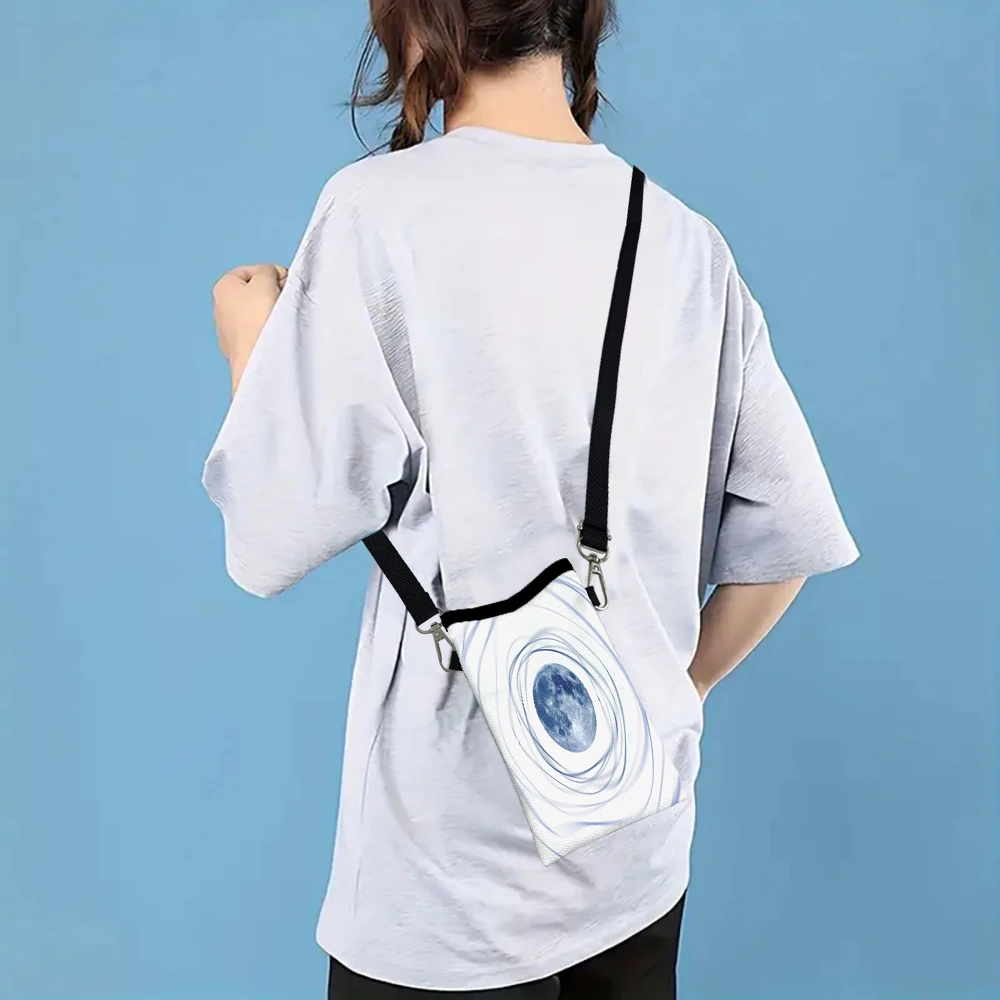 

Painting Blue Planet with A Swirling Circle Around It FashionPhoneBag Multifunctional Crossbody Adjustable Strap ShoulderBag2.11