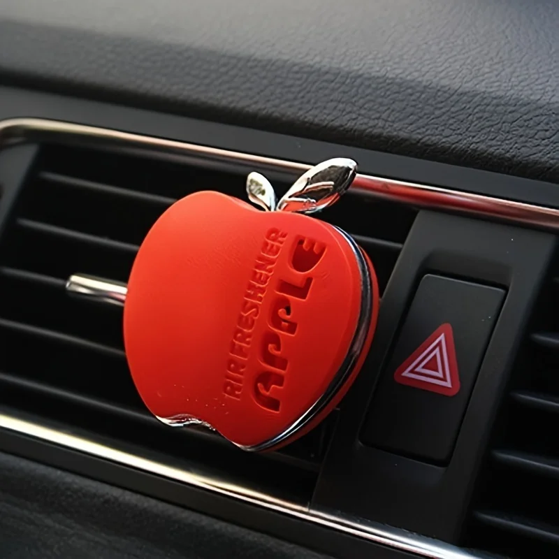 An apple-shaped car air freshener with floral fragrance - featuring a decorative ventilation clip design 2