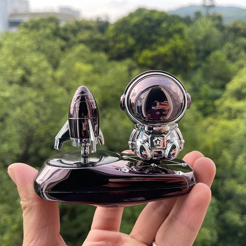 Solar Spaceman Rotating Rocket Aromatherapy Car Ornament Creative Car Aromatherapy Car Dashboard Decoration Car Accessories