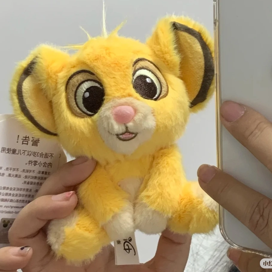 Disney Il Re Leone bambino Simba peluche ciondolo giocattoli Anime carino portachiavi per auto ciondolo zaino moda regalo di compleanno Kawaii